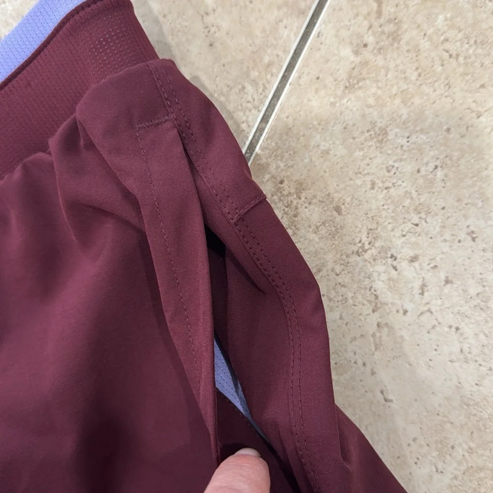 Fabletics Men's Burgundy Athletic 7 inch Shorts with Lavender Waistband NWT - Picture 8 of 11